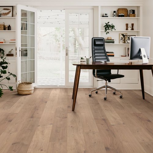 in home office with laminate floors