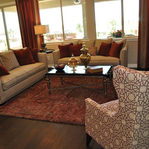 Living room with red rug